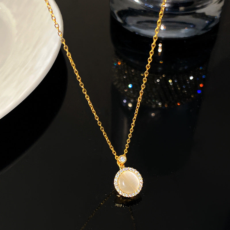 Minimalist Luxury Round Micro-Paved Cubic Zirconia Rotating Cat's Eye Moonstone Titanium Steel Necklace for Women