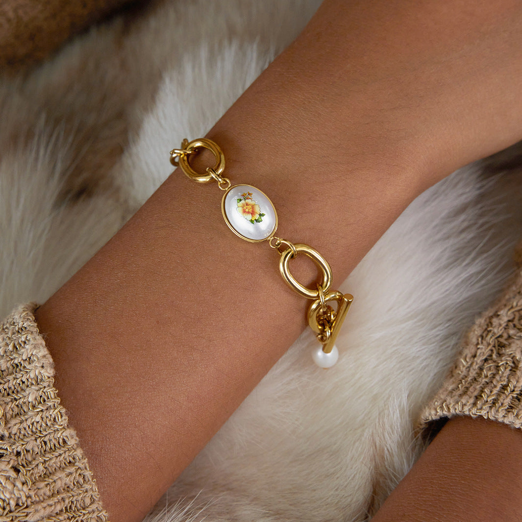Elegante bracciale geometrico in acciaio inossidabile con perle d'acqua dolce e placcatura in oro da donna