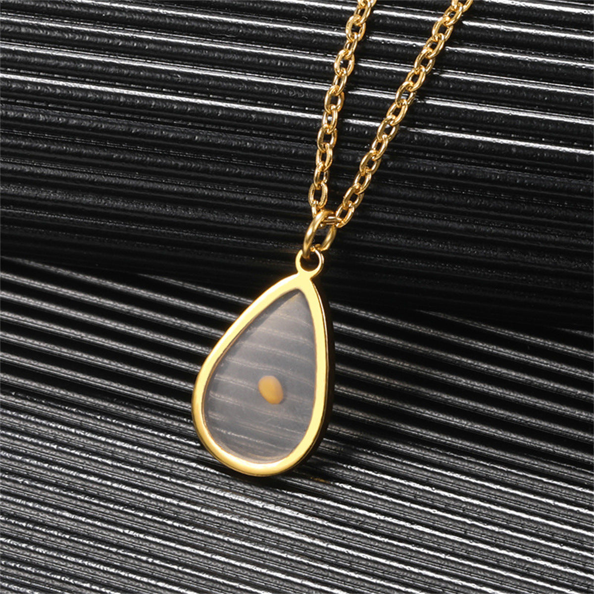Minimalist Oval Time Pendant Necklace in Stainless Steel with Titanium Steel Charm and Electroplated Finish for Unisex Everyday Wear