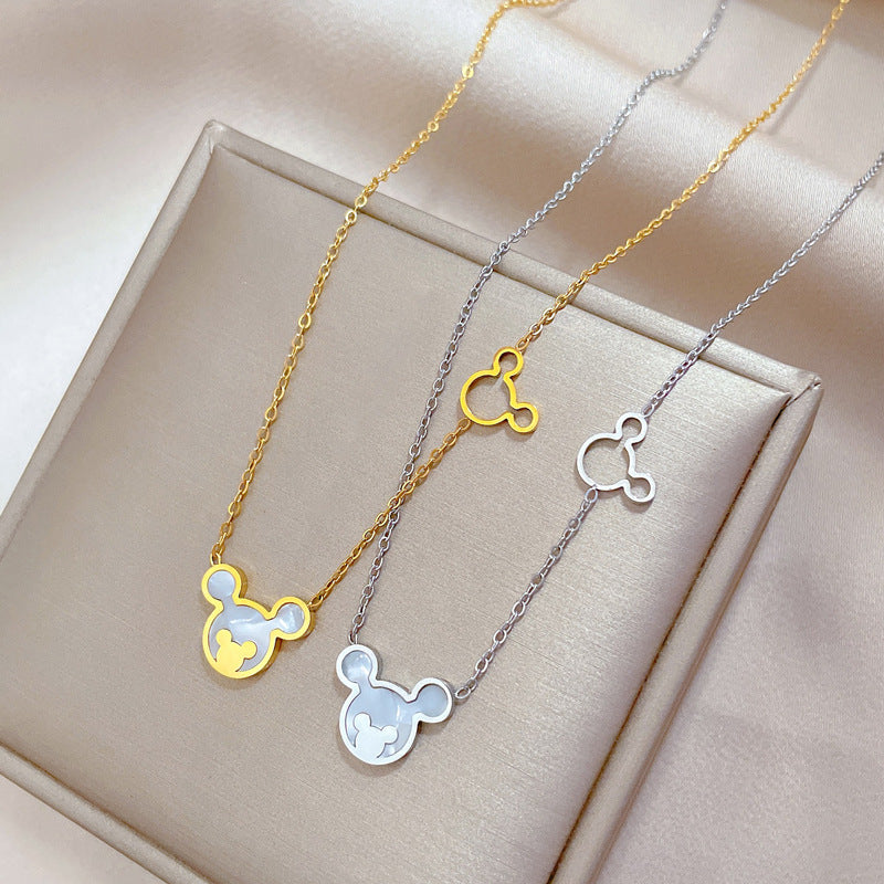 Collana girocollo minimalista in acciaio al titanio con motivo floreale, geometrico e cartone animato