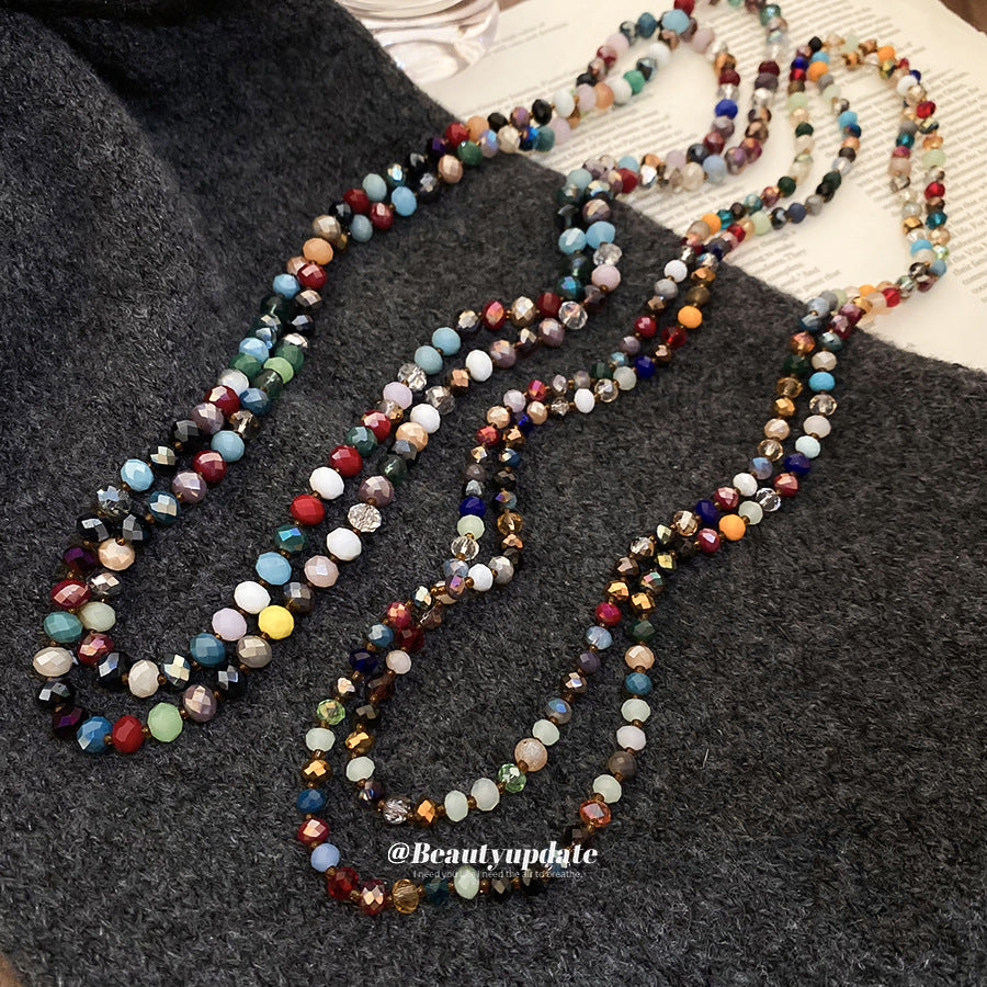 Collana da donna bohémien etnica geometrica con perline e dettagli in cristallo