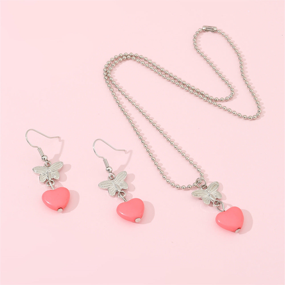 Set Collana con Ciondolo a Farfalla e Cuore in Resina con Catena di Perline per Bambini