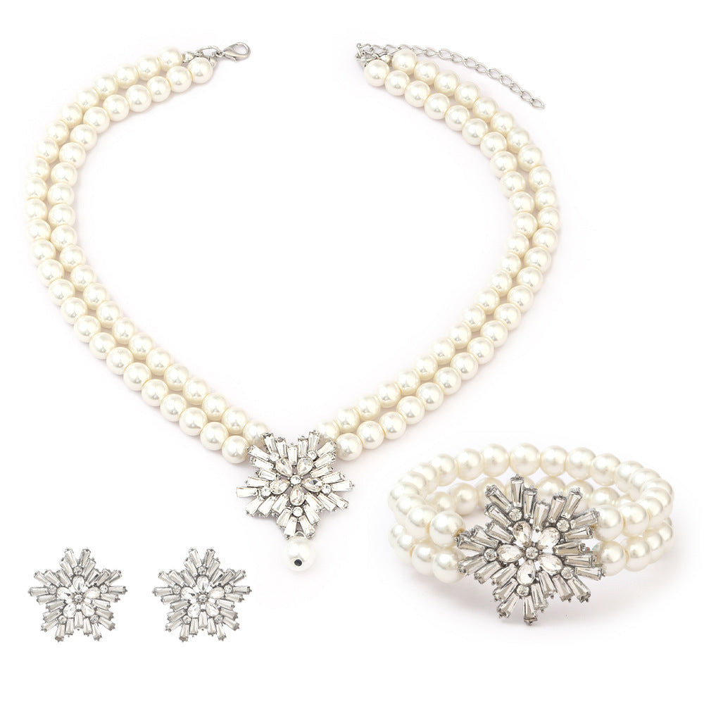 Minimalist Snowflake Pearl Necklace Set with Alloy Pendant and Rhinestone Accents for Women Includes O-Chain Necklace Earrings and Bracelet