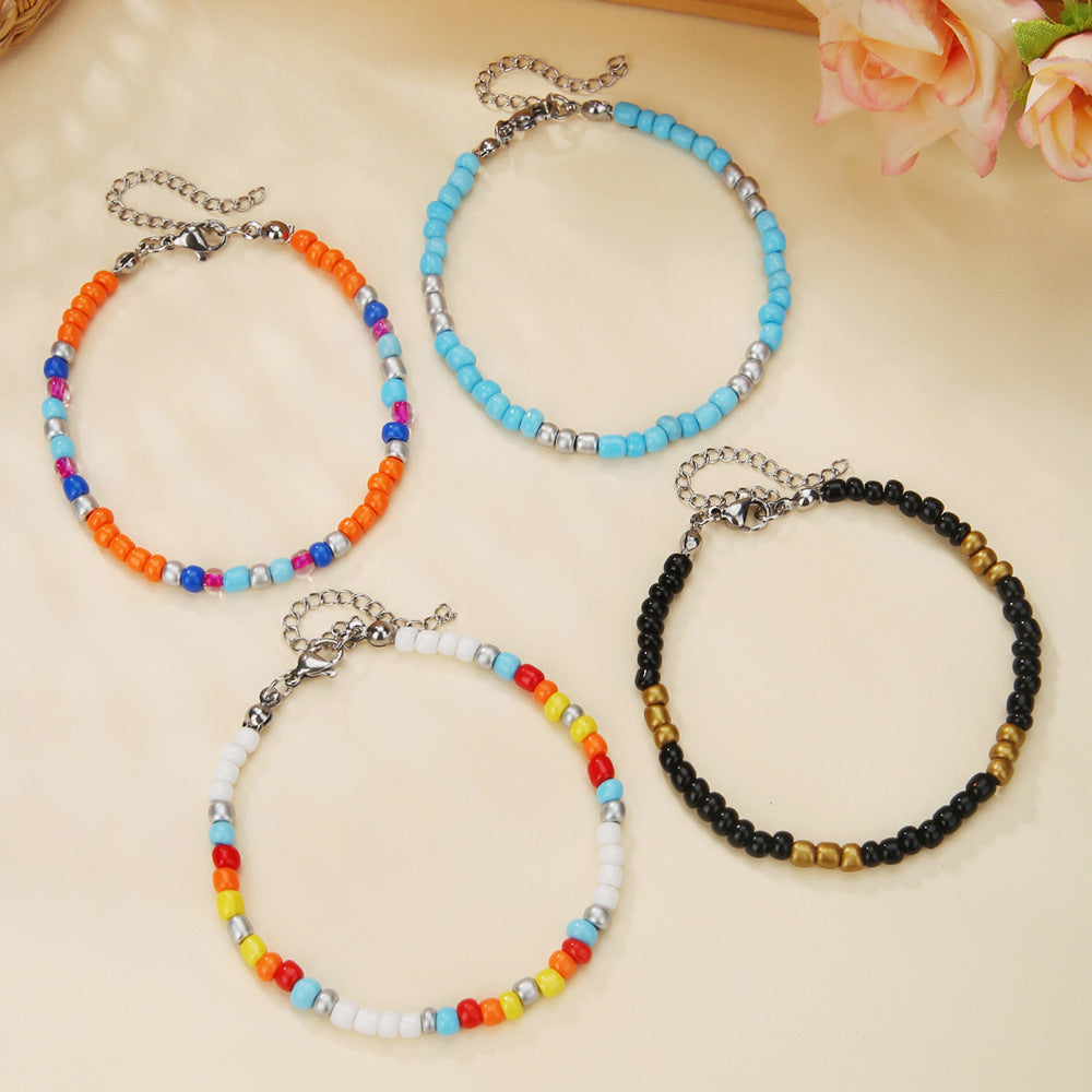 Braccialetto e Cavigliera Multi-strato Boho con Perline Rotonde Artigianali Accessorio Moda