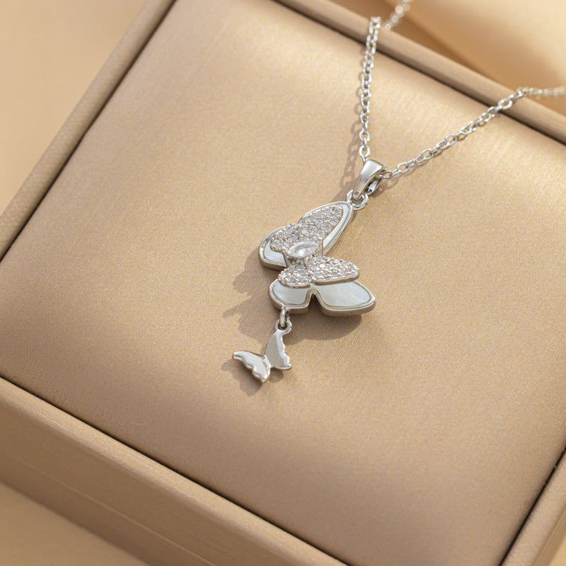 Collar con colgante minimalista de nudo de lazo de acero de titanio para mujer con cadena de serpiente chapada