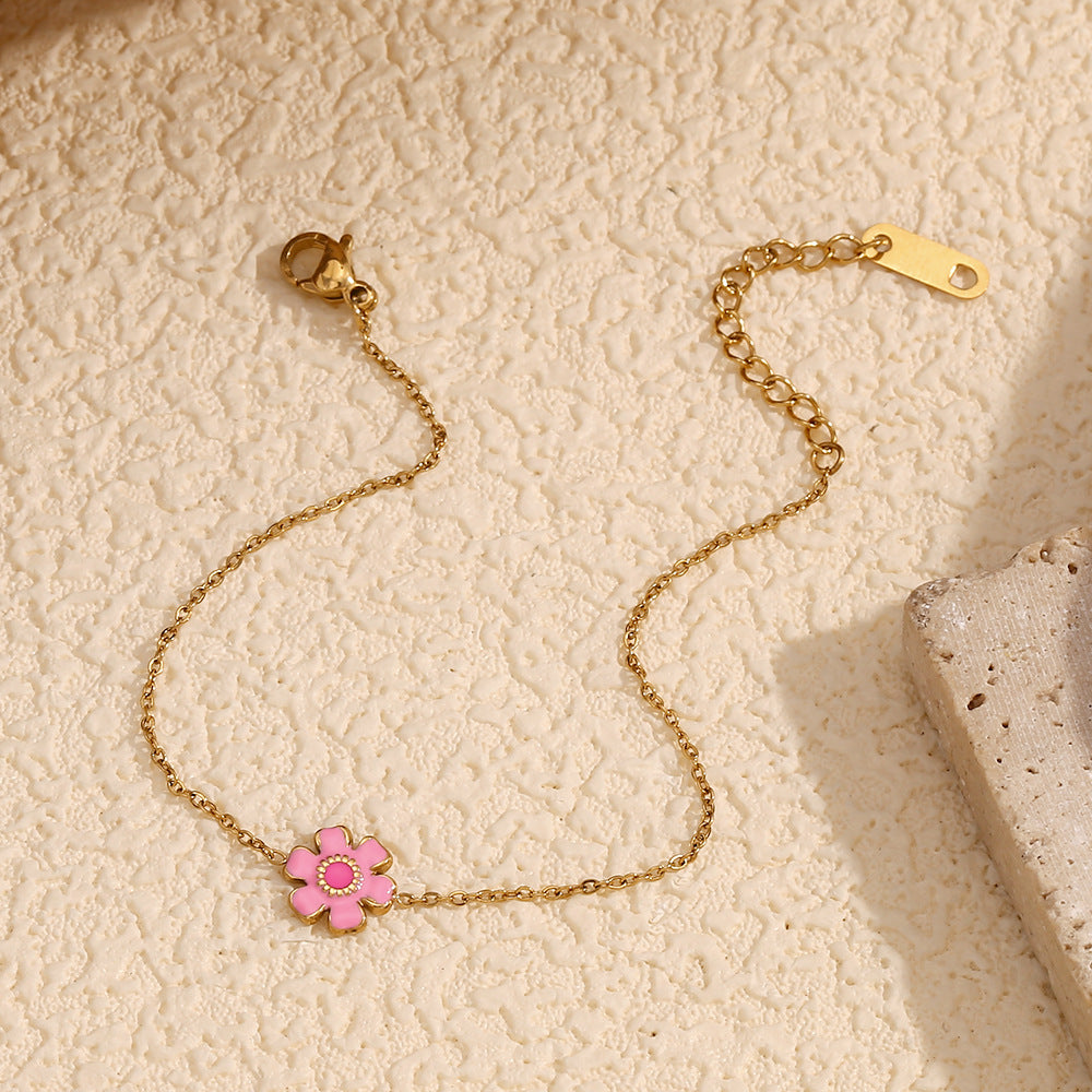 Bracciale da donna in acciaio inossidabile placcato oro 18K con smalto a forma di petalo di fiore alla moda