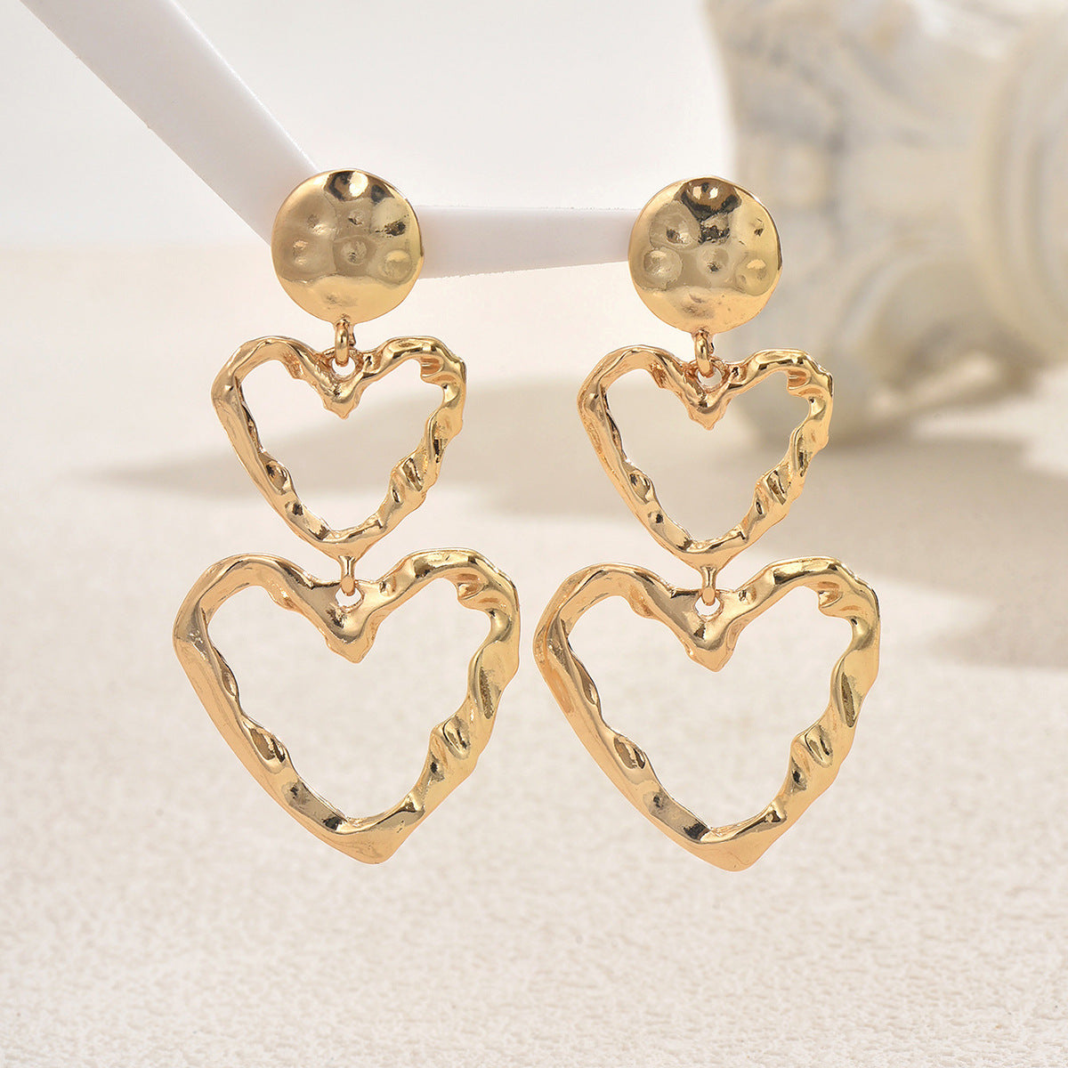 Pendientes de tuerca minimalistas en forma de corazón de aleación de zinc con acabado chapado para mujer