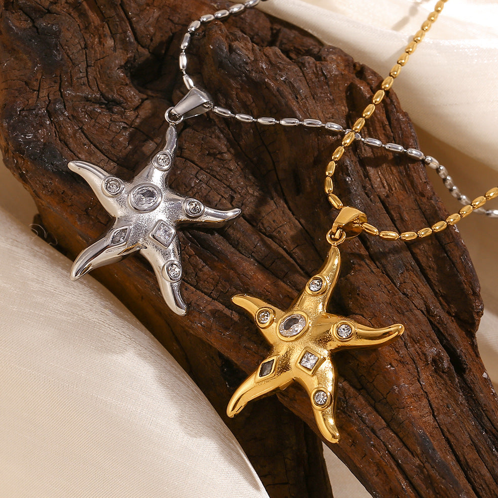 Collar con colgante de estrella de mar geométrica para mujer en acero inoxidable con baño de oro de 18K e incrustaciones de circonitas