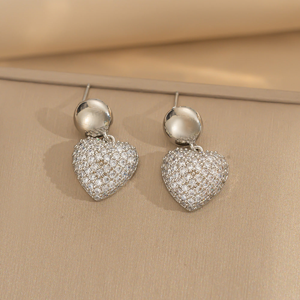 Orecchini a perno Saturno minimalisti color oro in ottone con zirconi per donna