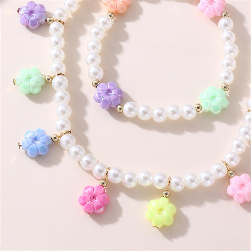 Dulce juego de collar y pulsera de cristal con nudo floral para niñas con colgante de aleación en colores pastel de helado