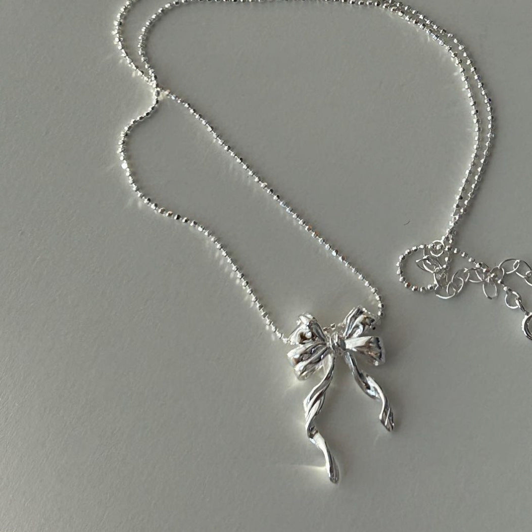 Minimalist Bowknot Necklace in 925 Sterling Silver with Geometric Shape and Rhodium Plating for Women