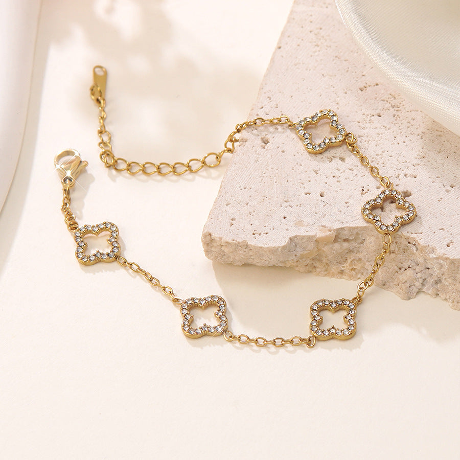 Elegante Bracciale Minimalista da Donna in Acciaio Inossidabile Placcato Oro con Zirconi e Quadrifoglio