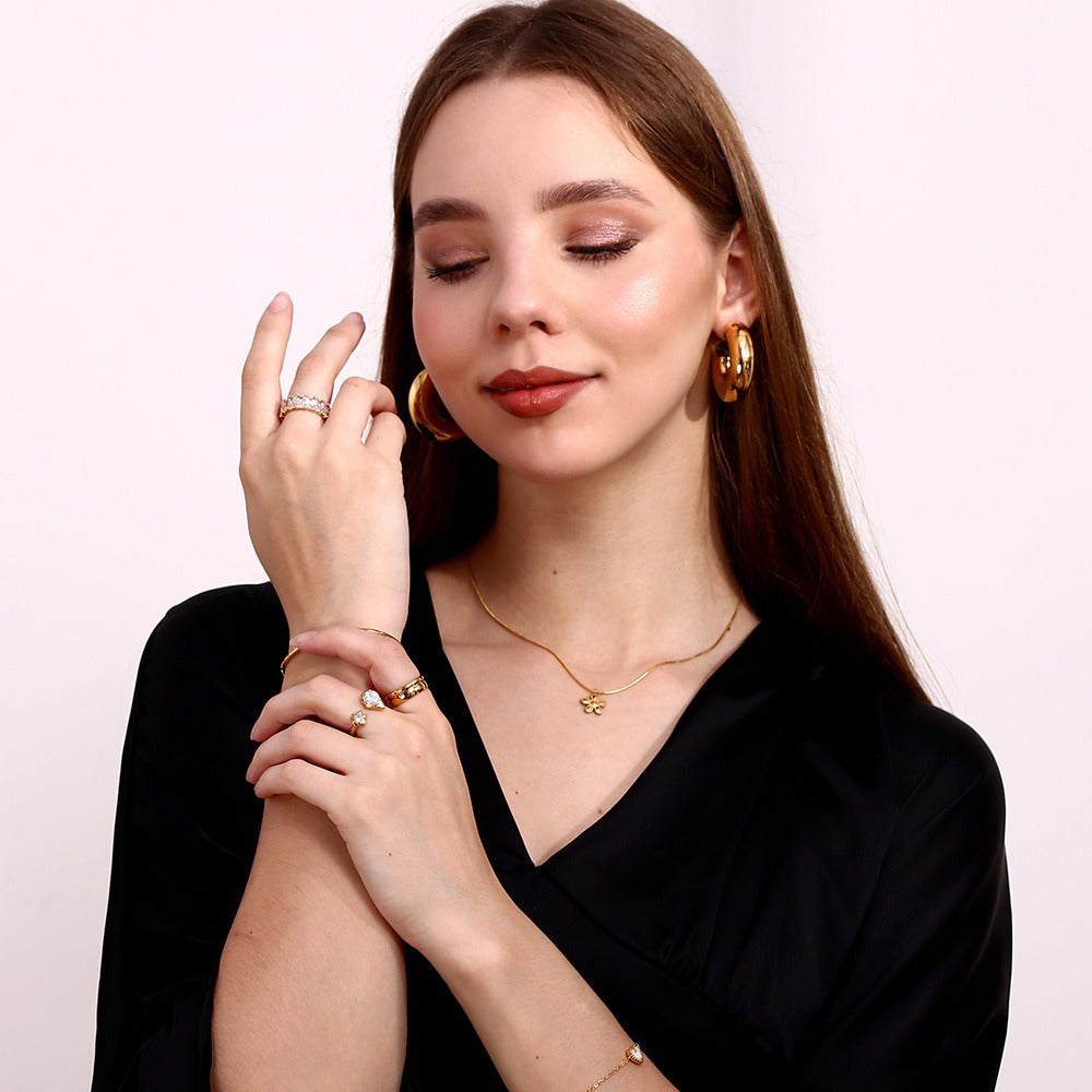 Anello asimmetrico da donna a forma di goccia con stella in zircone, in acciaio inossidabile placcato oro 18K