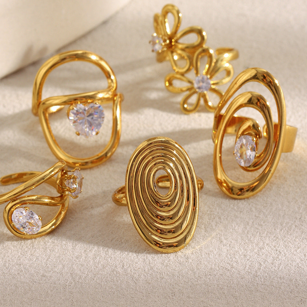 Anillo Minimalista Geométrico de Acero Inoxidable con Baño de Oro de 18K y Detalles Florales en Espiral de Circonita para Mujer