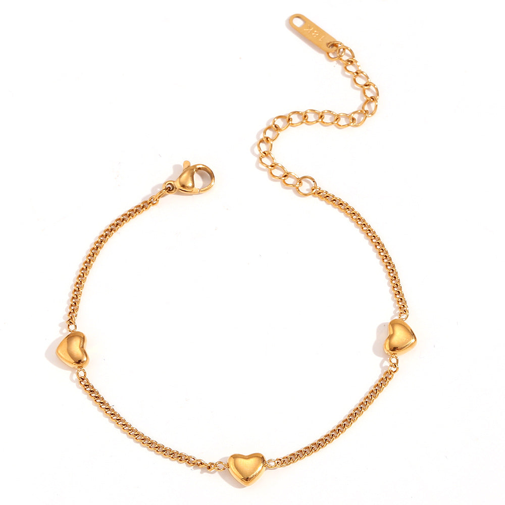 Moderno juego de pulsera y collar de acero inoxidable con forma de corazón chapado en oro de 18 quilates para mujer