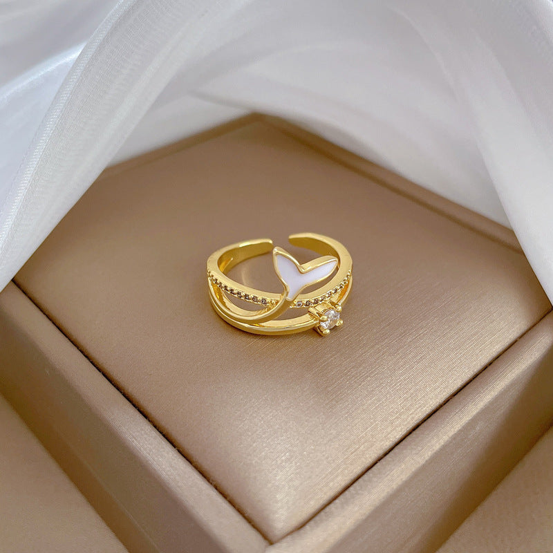 Anello regolabile a coda di sirena in stile fumetto in ottone con finitura placcata per donna