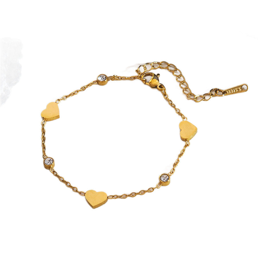 Elegante set collana e bracciale in oro 18 carati placcato con zirconi cubici a forma di cuore, catena in acciaio inossidabile e titanio per donne