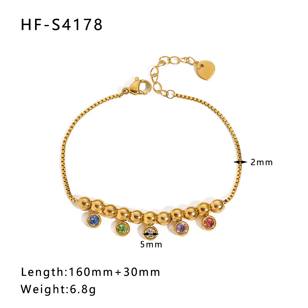 Bracciale vintage con farfalla e ciondolo rotondo in acciaio inossidabile con intarsio di strass e dettagli in perle