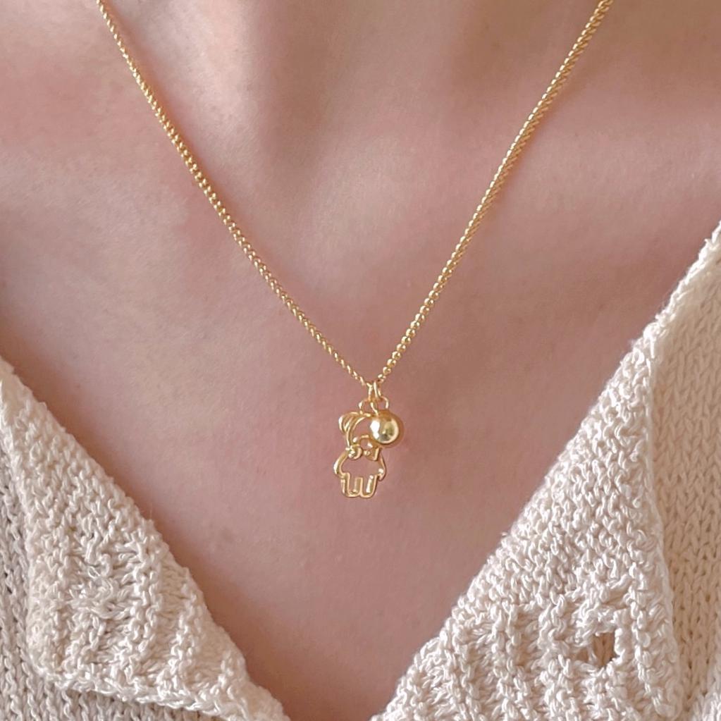 Collar con colgante de oso minimalista de plata de ley 925 con baño de oro en cadena cruzada para mujer