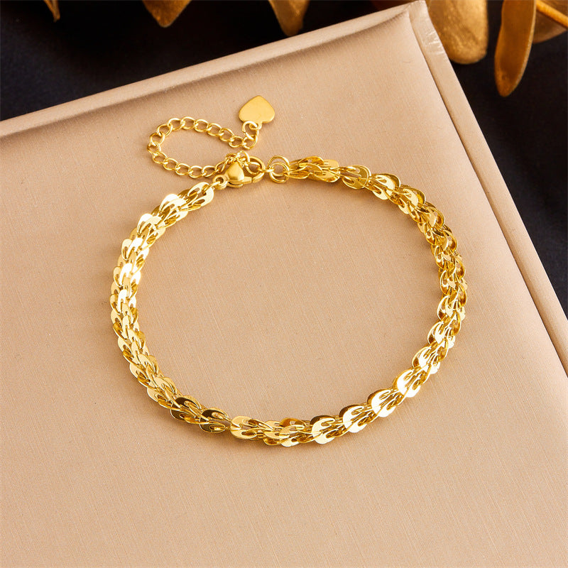 Bracciale a catena con coda di piuma in acciaio inossidabile placcato oro alla moda minimalista da donna