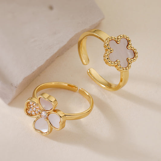 Anillo abierto geométrico minimalista con forma floral para mujer en cobre con acabado chapado