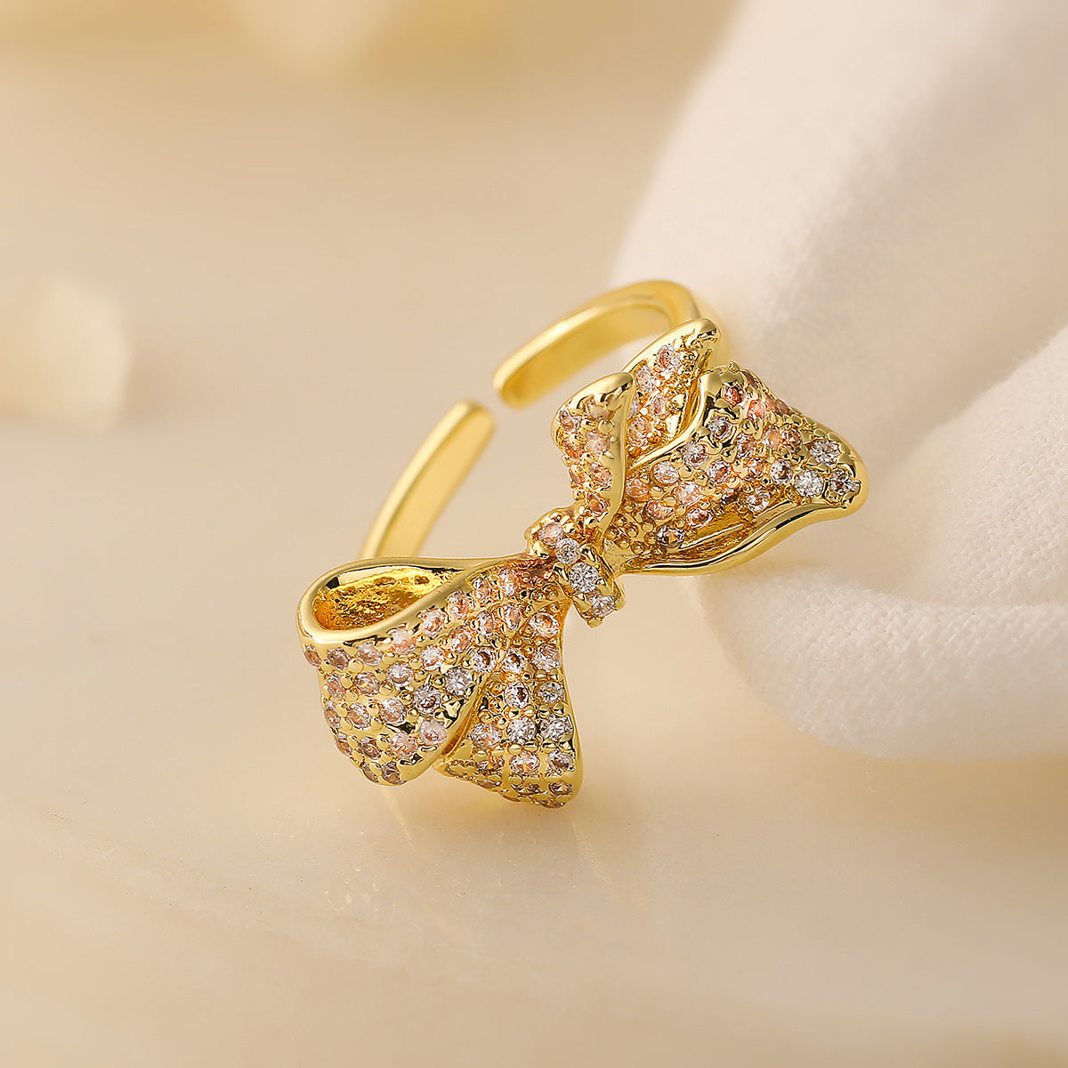 Fashionable Bowknot-Shaped Adjustable Ring for Women Made of Copper with 18K Gold Plating and Micro-Pavé Zirconia