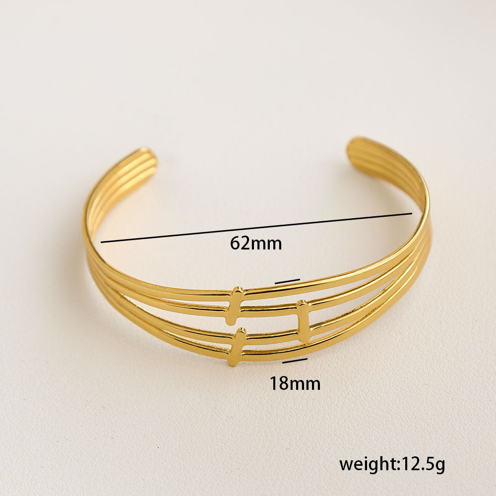 Bracciale Minimalista Ispirato alla Francia in Acciaio Inossidabile con Trafori a Motivi Floreali di Foglie e Girasoli