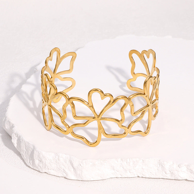 Bracciale a Polsino Aperto Minimalista in Acciaio Inossidabile Placcato Oro 18K con Design Floreale Intagliato
