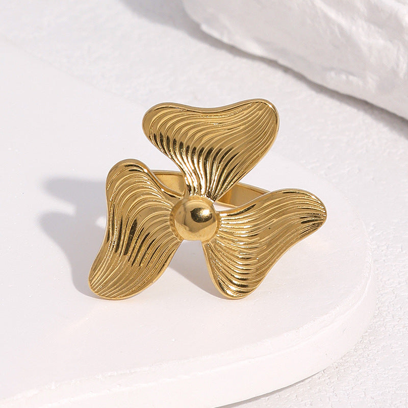Anello a fascia floreale minimalista in acciaio inossidabile con placcatura in oro 18 carati da donna