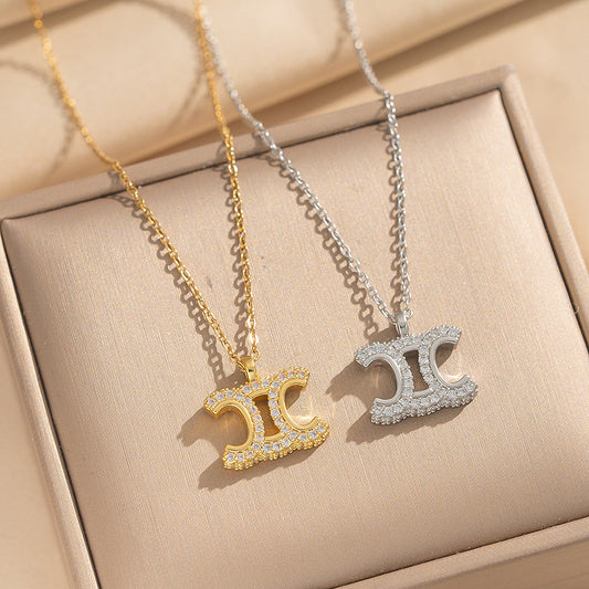 Collana con Pendente Lusso Minimalista Arco di Trionfo per Donna in Acciaio al Titanio con Placcatura Oro e Intarsio di Zirconi