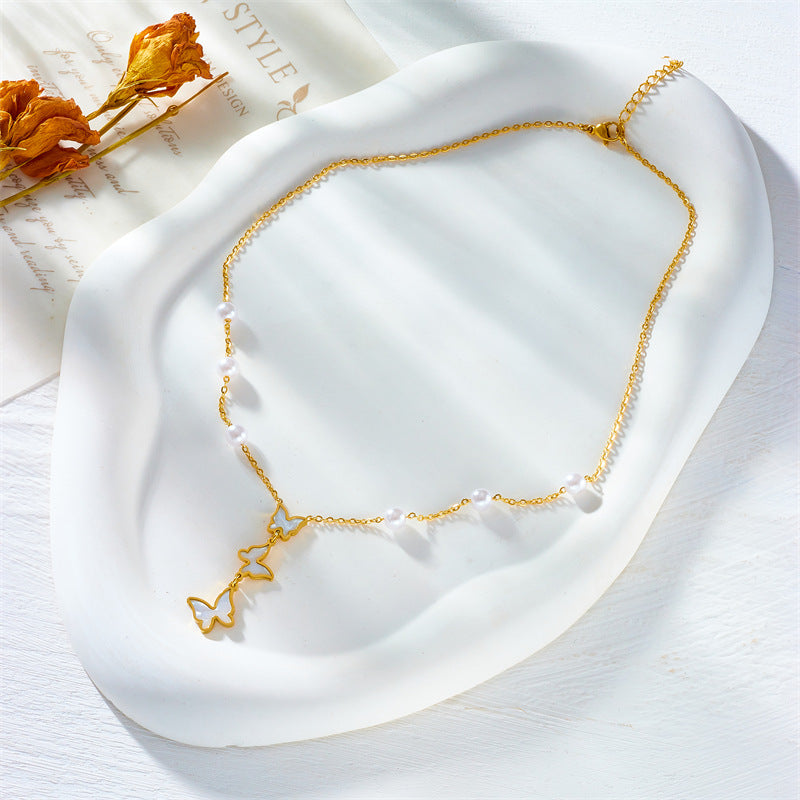Vintage-Inspired Butterfly Pendant Necklace in Titanium Steel with Polished Finish and Fringe Detail for Women
