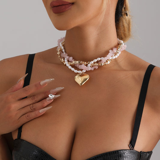 Collana da donna con ciondolo a perla barocca a forma di cuore minimalista con charm in lega placcata e catena in resina