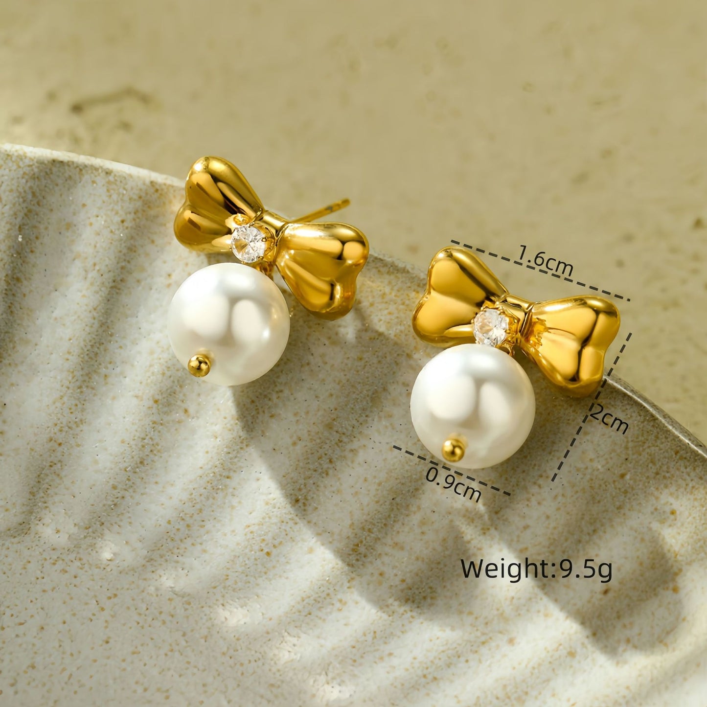 Pendientes elegantes de acero de titanio con lazo para mujer con detalles de pedrería, aretes de acero inoxidable en forma de corazón, minimalistas y versátiles