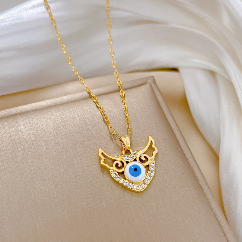 Collana girocollo di lusso a cuore e ali da donna in acciaio al titanio con finitura placcata, design geometrico, motivo luna, catena delicata