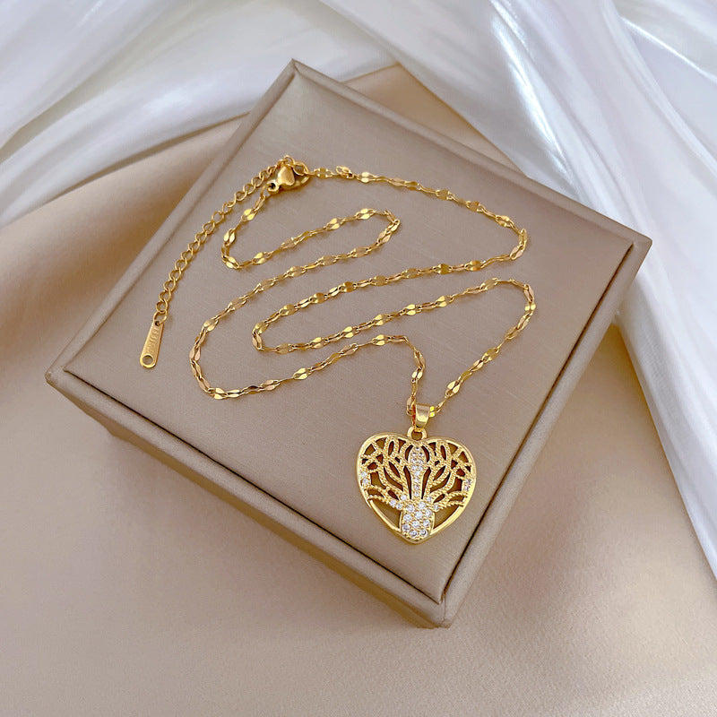 Collana con pendente a cuore cavo minimalista per uomo e donna, catena a serpente in acciaio inossidabile con strass