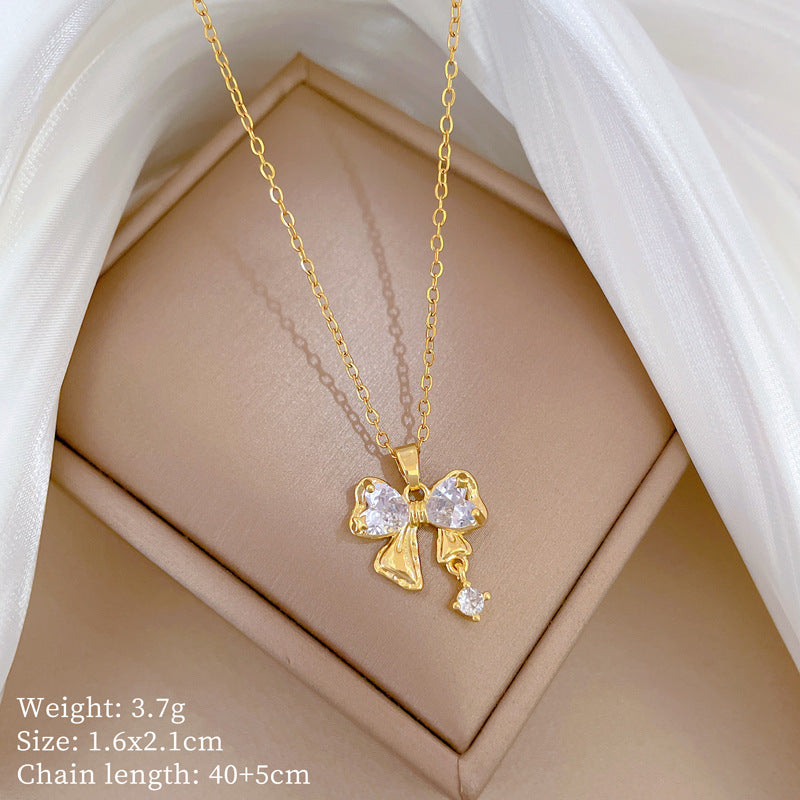 Collar de lujo de acero de titanio con colgante de mariposa y lazo de diamantes de imitación para mujer con cadena ajustable de 21 a 50 cm