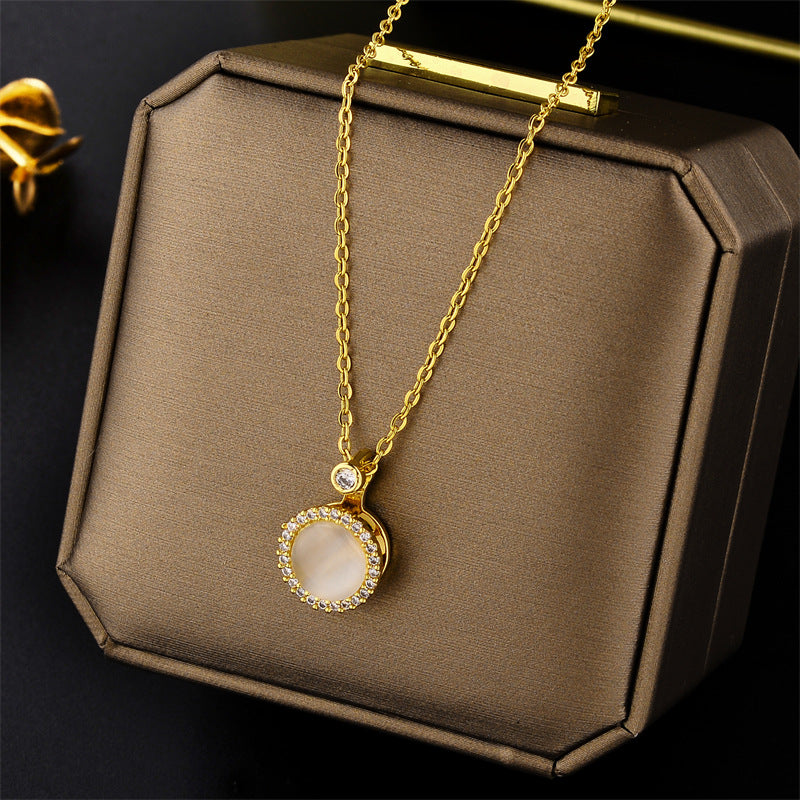 Rotating Cat's Eye Necklace for Women with Micro-Paved Zirconia, Titanium Steel Pendant on Wavy Chain, Geometric Design with Plated Finish