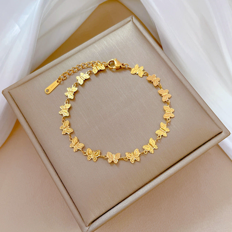 Bracciale vintage minimalista con farfalla in acciaio al titanio placcato oro per uomo e donna
