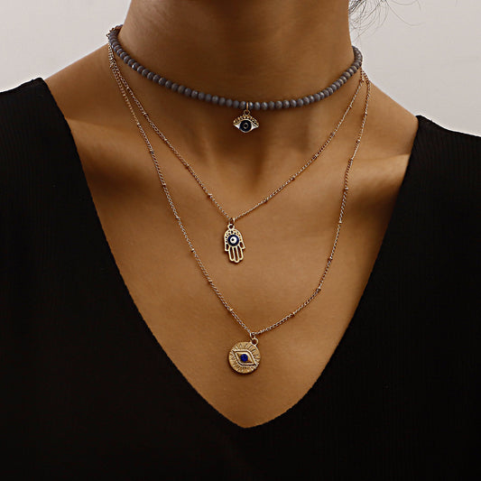 Collana con ciondolo geometrico a occhio di Allah blu con strass intarsiati e lega placcata oro da donna