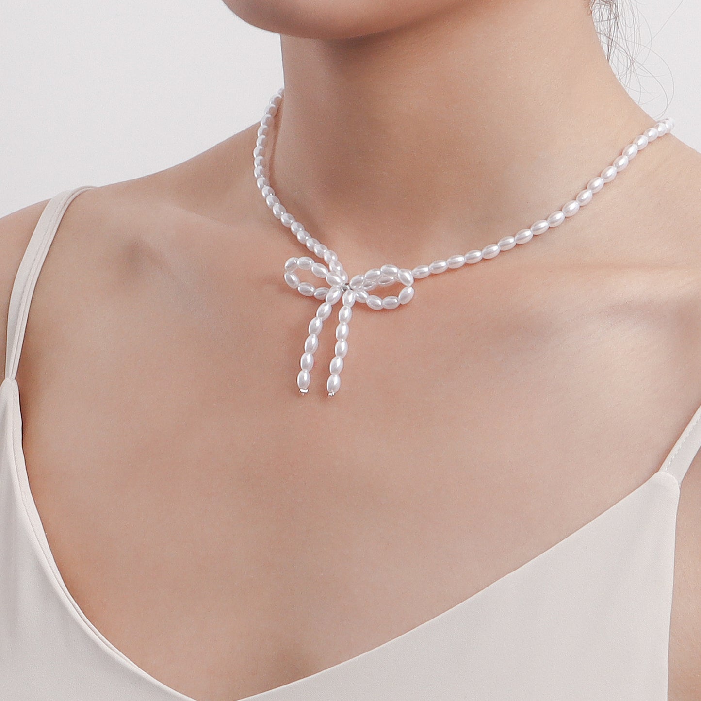 Minimalist Bow-Knot Choker Necklace for Women with Imitation Pearls and Alloy Pendant, Electroplated Finish, Geometric Design