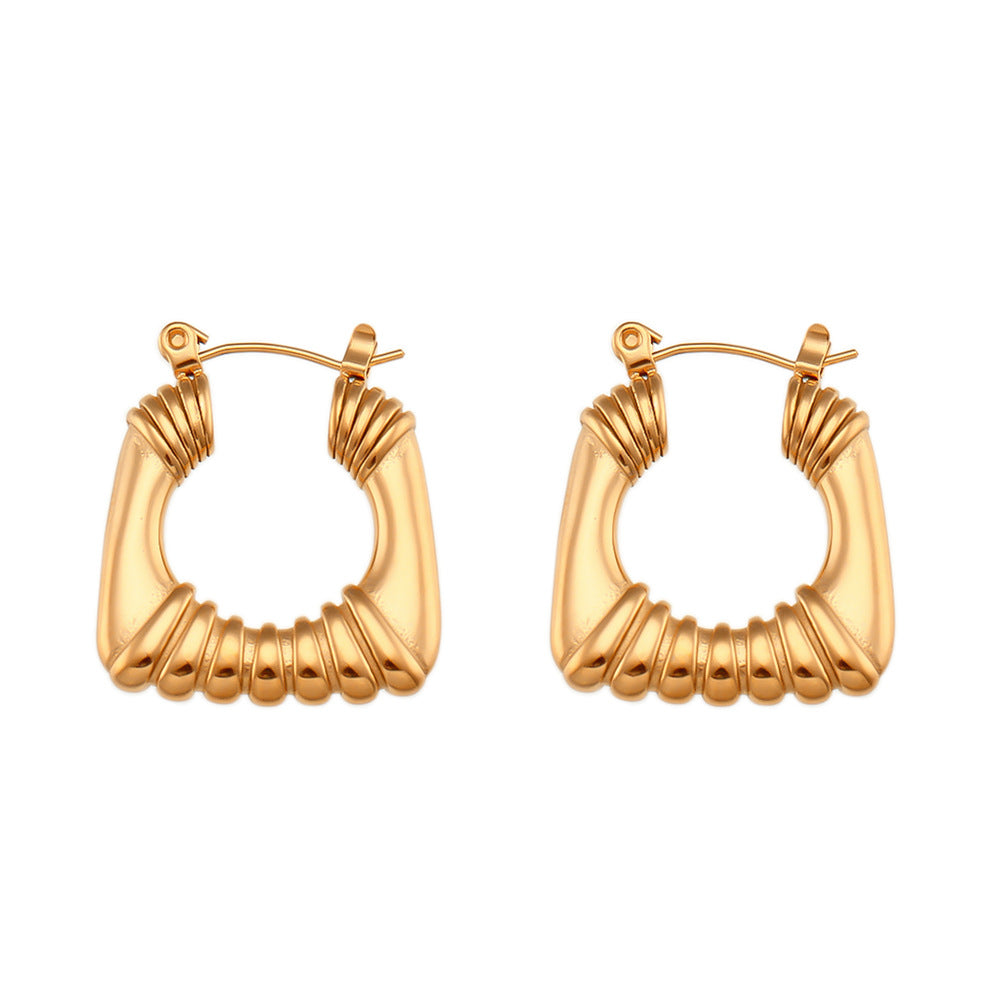 Orecchini a cerchio geometrici vintage in acciaio inossidabile con placcatura in oro 18 carati e dettaglio traforato