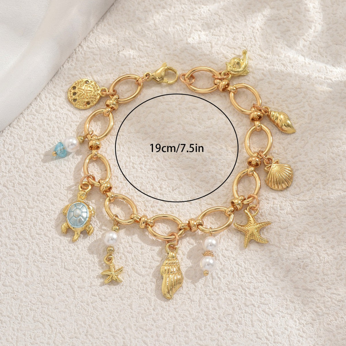 Ocean-Themed Turtle and Seashell Pendant Bracelet for Women with Pearl Inlay and Copper Construction