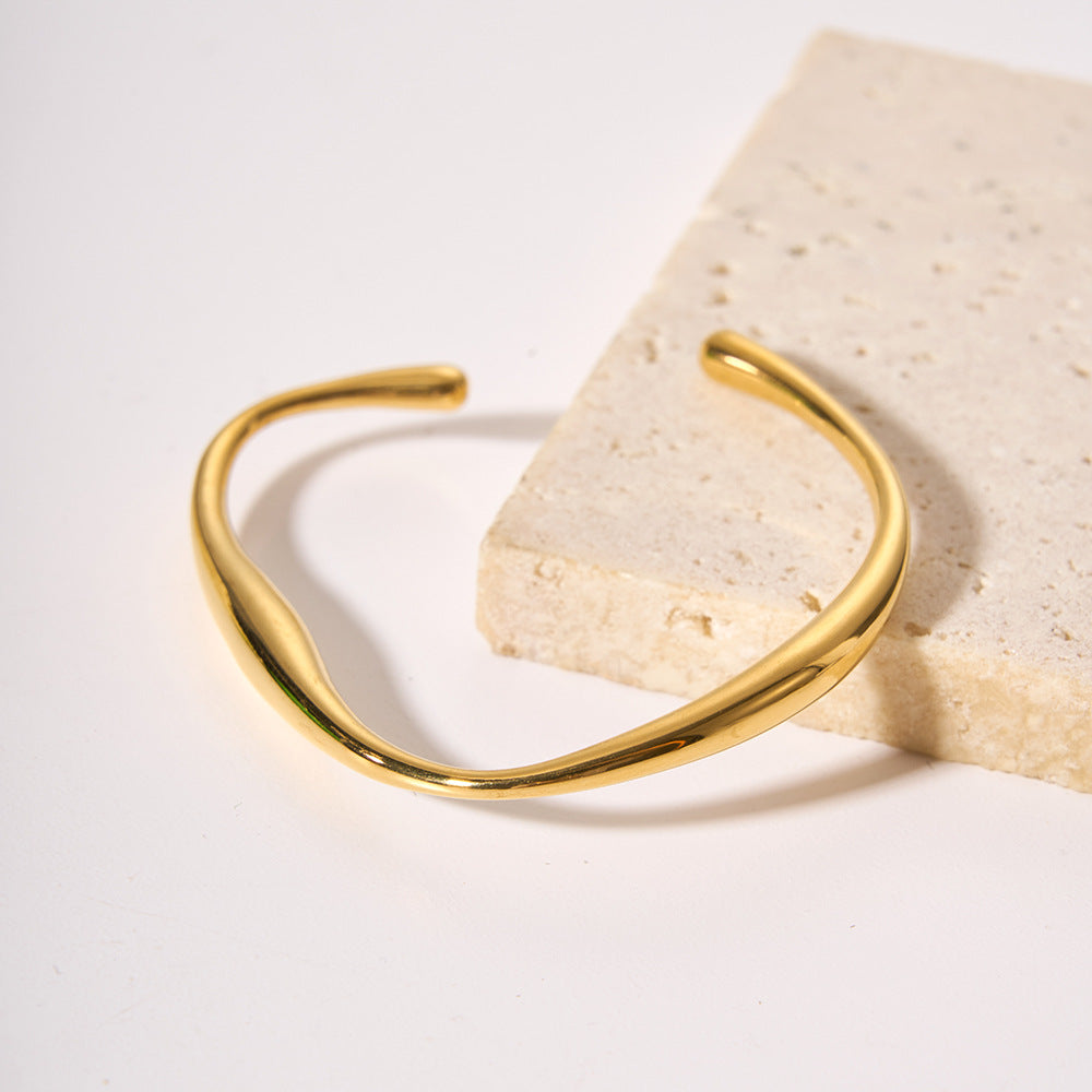 Bracciale rigido aperto geometrico minimalista da donna in acciaio inossidabile placcato oro