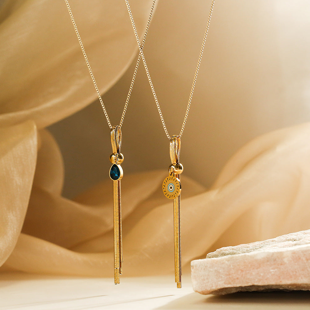 Collana Minimalista Geometrica in Acciaio al Titanio da Donna con Placcatura in Oro e Pendente a Goccia con Zircone