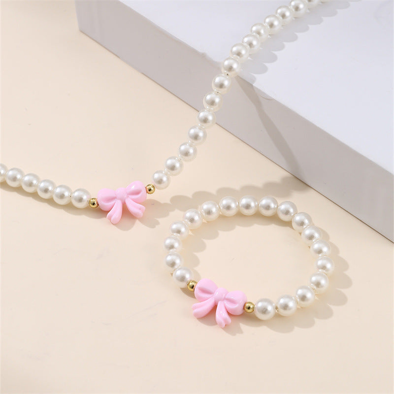 Set collana in lega a forma di fiocco stile principessa per ragazze con catena di perline rotonde e finitura artigianale