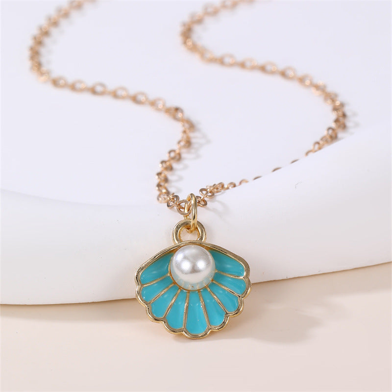Dulce Collar con Colgante de Mariposa y Lazo Fresco para Niñas con Dije de Concha con Perlas de Aleación y Acabado Esmaltado Artesanal