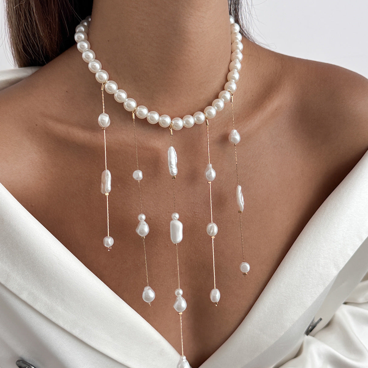 Minimalist Cross Pendant Clavicle Necklace for Women with Imitation Pearl Accents and Crystal Tassels on Electroplated Alloy Chain