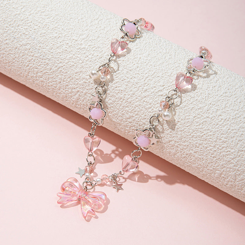 Collana con perline di vetro fatte a mano a forma di fiocco per bambine con ciondolo in lega, stile fresco e dolce
