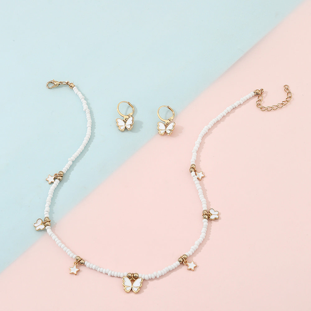 Set de collar con colgante minimalista de mariposa y estrella para niñas, joyería de aleación con cadena de perlas