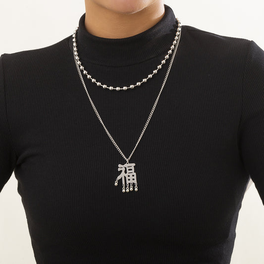 Collana Pendente Geometrica Vintage da Donna con Nappa, Catena Metallica e Design Traforato